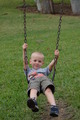 Robbie on Swings.JPG